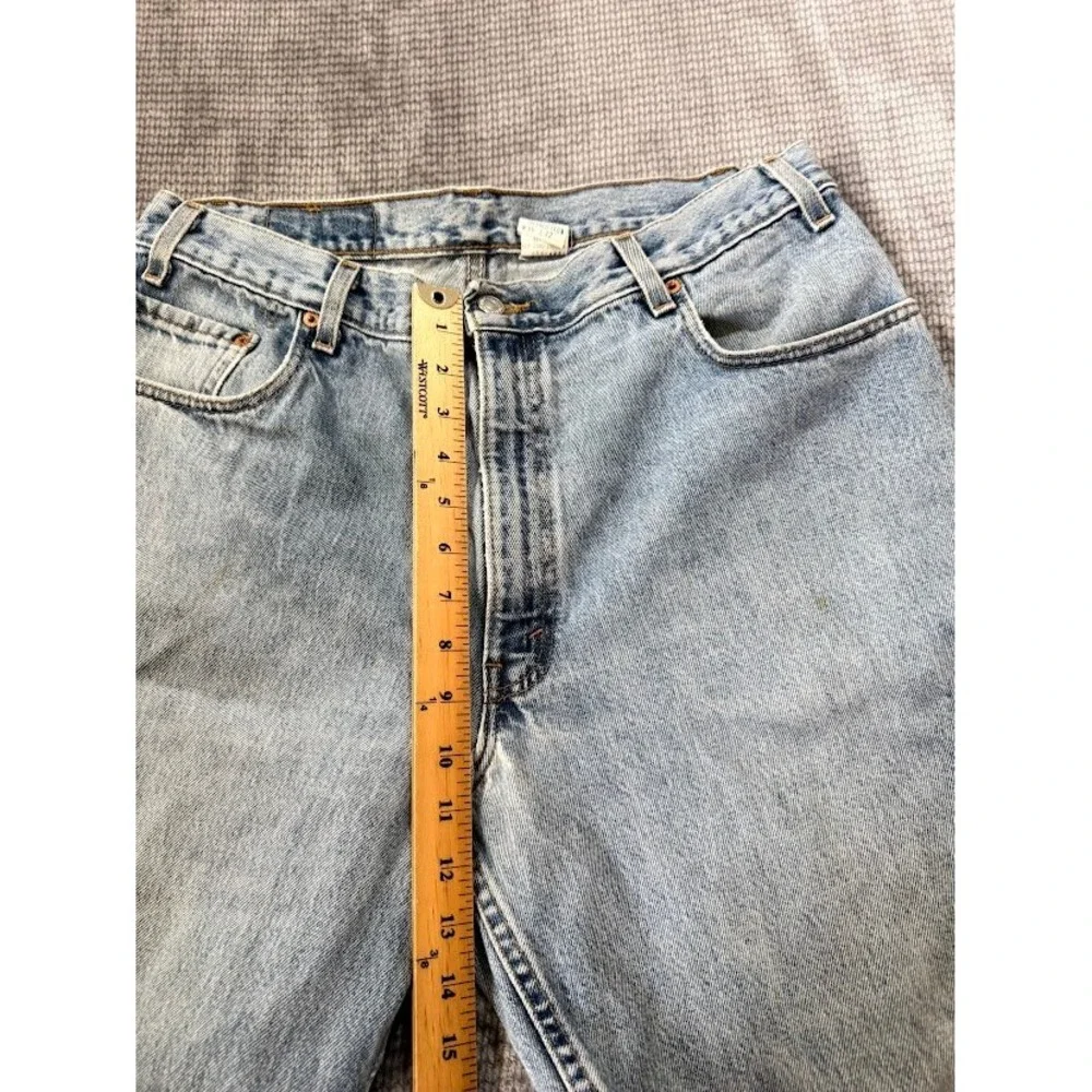 Vintage Levis 560 Loose Fit Tapered Leg Jeans Light Wash Denim USA Made 34x31